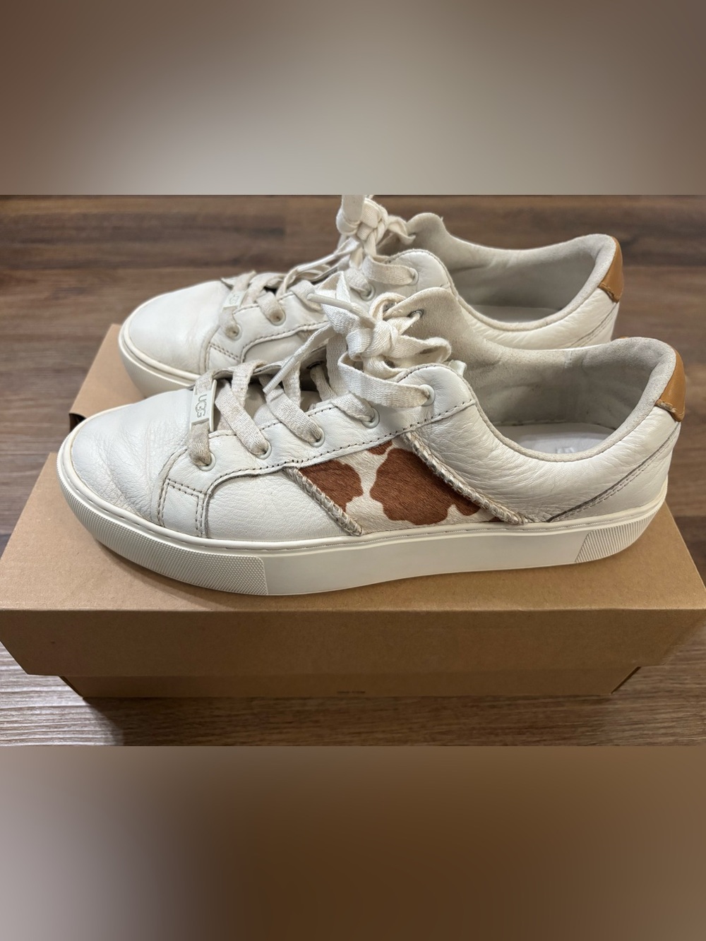 UGG Women's Dinale cow print tennis shoe size 9